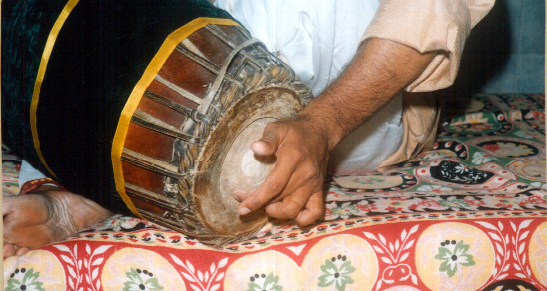 Gumukki mridangam stroke - deep bass tone requiring rava semolina paste on left side